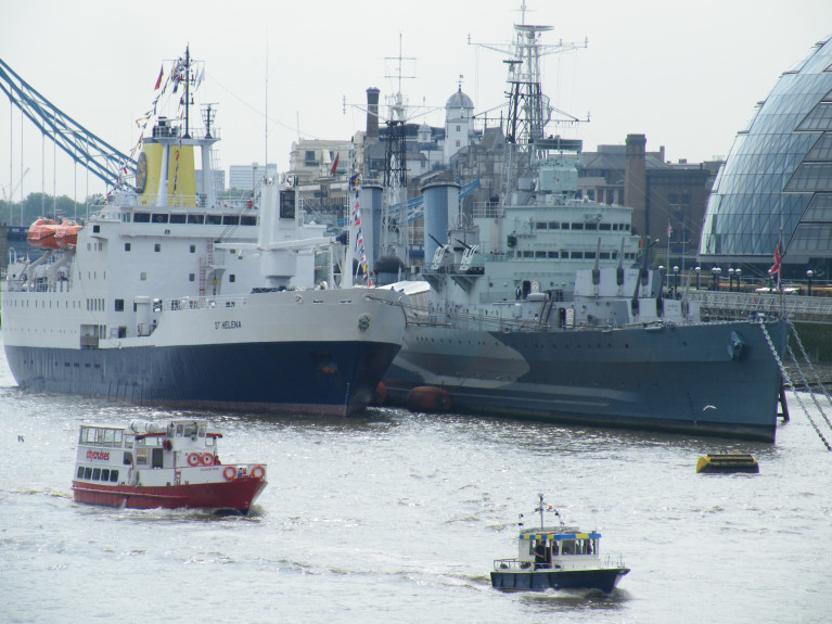 HMS Belfast berthed in the Pool of London, named the National Historical Ships UK Flagship of 2020, for showing, along with its fellow regional flagships, &quot;tenacity in continuing to raise their profile throughout the Covid-19 outbreak&quot;. In this file photo is also former St. Helena serving passenger cargoship RMS St. Helena during its historic farewell and only visit to the UK capital in 2016, before disposed following opening of an airport on the remote UK territory deep in the South Atlantic Ocean. During the mid 1990&#039;s RMS St. Helena notably visited Dublin and Cork during a cruise-charter. Afloat will have an update on this ship&#039;s sporting role!