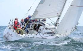 After nearly two hours of racing in up to 20–knots of wind, Gwilli Two (above) won by less than one foot off Greystones