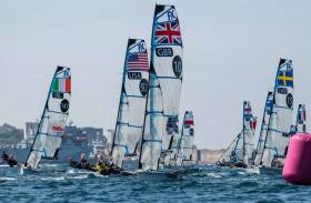 Team GB&#039;s Charlotte Dobson and Dun Laoghaire&#039;s Saskia Tidey (pictured centre, GBR 10) lead the fleet into a weather mark with Ireland&#039;s Annalise Murphy and Katie Tingle (left)