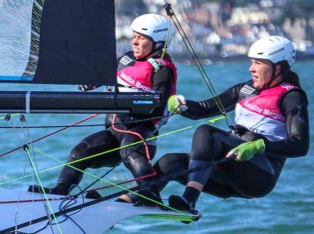 Katie Tingle (left) sailing with Annalise Murphy in the Olympic 49erFX dinghy