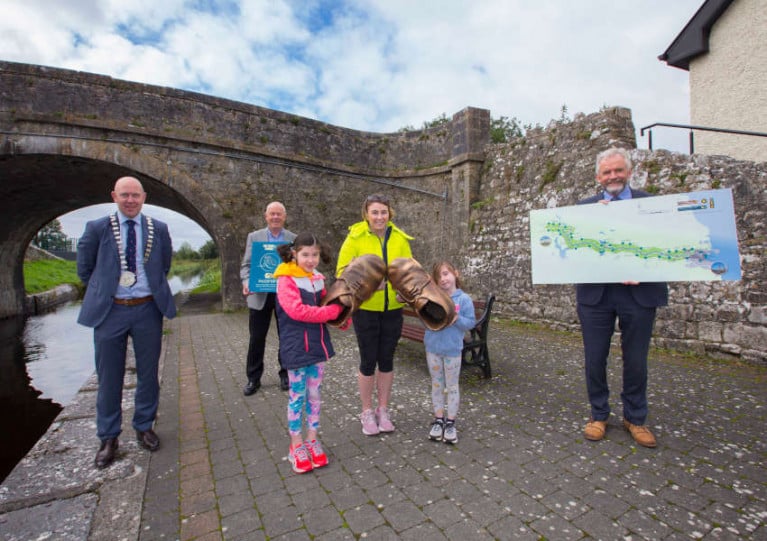 Laura Cullinan and her daughters, Isobel and Alexia, with (from left) Longford County Council cathaoirleach Paul Ross, chief executive John Mahon and regeneration chief John McKeon