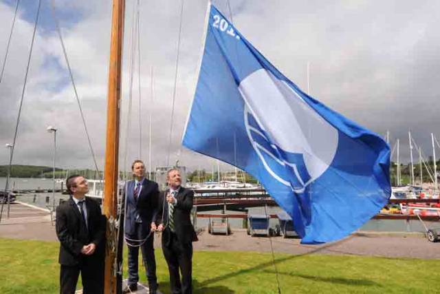 Flag raisers– (from left) Ian Diamond, An Taisce, Gavin Deane of Royal Cork and Senator Gerry Buttimer raise Royal Cork Marina's Blue Flag in Crosshaven yesterday
