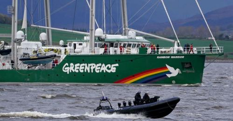 Youth climate activists on board Rainbow Warrior which was granted permission to sail to COP26. As above the vessel makes its way up the Clyde today.