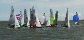 Action at the leeward mark, Shark Eleven leads from Second Wife