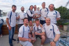 The all conquering Fools Gold crew from Waterford Harbour Sailing Club with the 2017 Sovereign&#039;s Cup. Straight wins across the series - a string of six bullets - in Class 1 IRC which was the largest division with 16 boats out of the 98-strong fleet meant Rob McConnell’s result was the best score of the event. Pictured (Back row) left to right: Roy Darrer - Helm Stephen McConnell - Bow Rob McConnell - Skipper Aaron Power - Trimmer 2 Dougie Power - Mast  Graham Curran - Trimmer 1  (Front row) left to right: Stephen Ryan - Backup Trimmer Marcella Connolly - Mid-bow Greg Morrisey  - Pit Tom Fitzpatrick -Tactician. Not pictured: Brian Heneghan