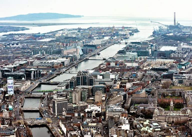 The city of river and sea. Modern Dublin and its port looking eastward