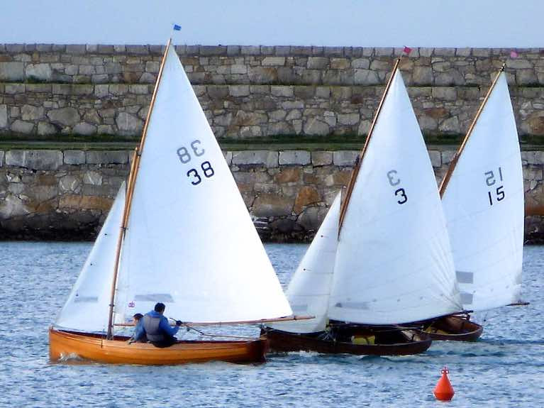 Always in the cut and thrust of it, even after 114 years. Vincent Delany’s veteran Water Wag Pansy (no 3) is well able to mix it with much newer boats, and last night (Wednesday) she became the first medal-winner in the National YC’s 150th Anniversary Regatta