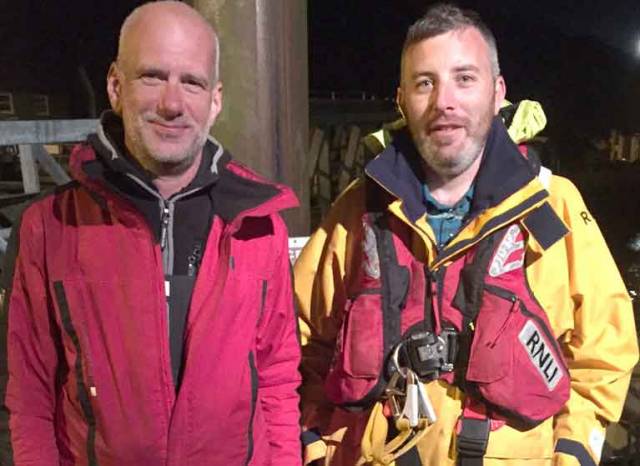RNLI Coxswain Kevin Young (right) with the solo skipper Rees Hopkins