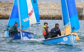 Defending champions Micheál O&#039; Sullivan and Mikey Carroll lead a race at the 2018 All Ireland Junior sailing championships raced inside Dun Laoghaire Harbour