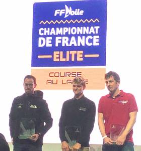 Solemn moment…..Ireland’s Tom Dolan (right) looking unusually serious as he is honoured for his third place in the rookie division in the French Offshore Championship at the Paris Boat Show