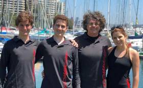 Family afloat – Douglas, James, Jim and Julia Cooney dockside in Sydney. James and Julia are sailing with Jim to Hobart on Comanche but Douglas is under age for the race