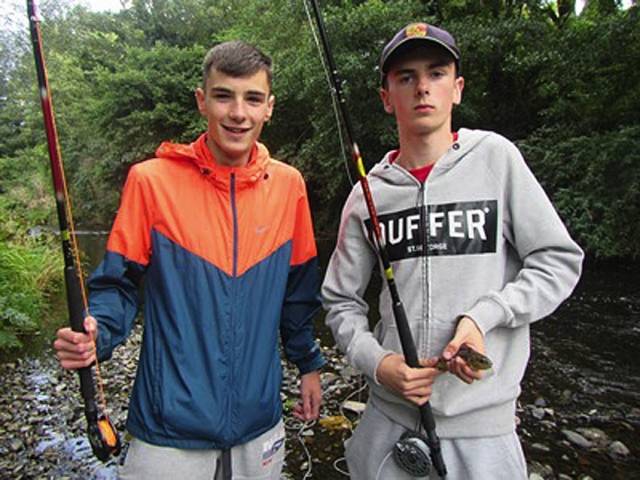 Nicky O'Hagan and Matthew McDonald of Whitechurch Youth Group enjoying the fishing in Milltown