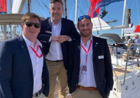 Francis Roche (left), Ross O&#039;Leary (centre) and Joss Walsh on the Jeanneau yacht stand in Southampton