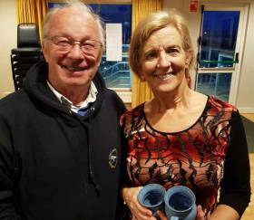 DMYC Frostbite mug winner Louise McKenna with club Commodore Frank Guilfoyle