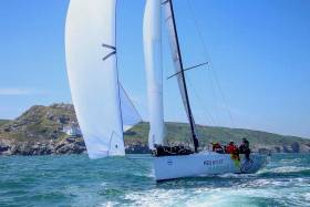 The 40th anniversary Round Ireland Race from Wicklow on June 20th will be an “alternative highlight” of the 2020 season, with fresh sponsorship from SSE Renewables. The 2018 winner, Baraka GP (a Ker 43), is seen here sweeping past Wicklow Head shortly after the start. The middle third of the race saw conditions go against her, and at one stage off the north coast of Mayo she was lying 23rd overall. But in the later stages, skipper Niall Dowling (RIYC) and navigator Ian Moore called the tactics to such good effect that Baraka took line honours and won overall. Photo: Afloat.ie/David O’Brien