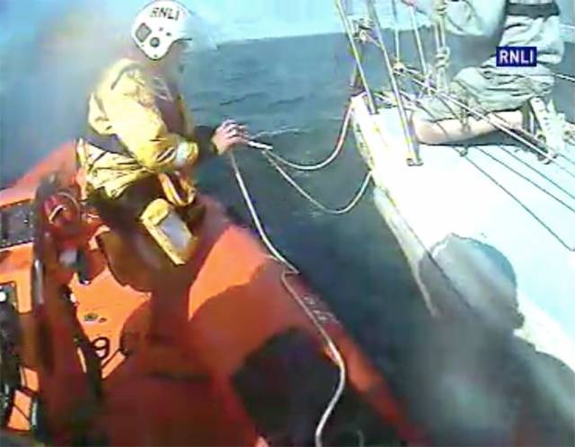Union Hall RNLI attaches a towline to the stricken yacht