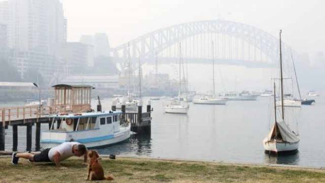 Smoke haze has cut visibility on Sydney Harbour to 0.1 nautical miles