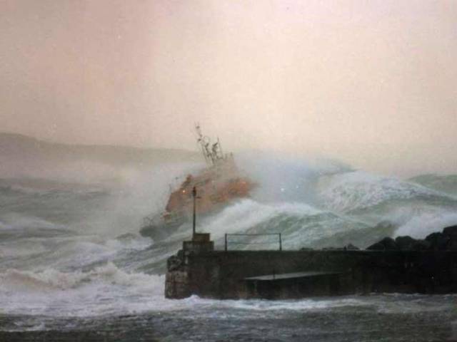 Is this the greatest lifeboat photo ever taken? Ian Watson’s iconic image of the Portrush Lifeboat putting to sea on February 13th 1989. Photo Ian Watson 