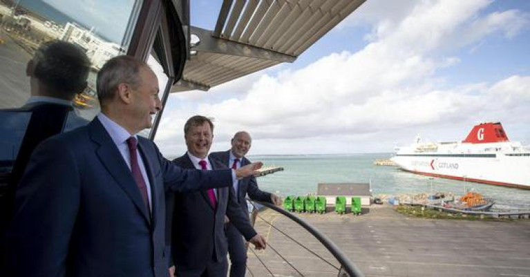  An Taoiseach visited Rosslare Europort, Co. Wexford, where he was photographed (at the port's control tower) with Jim Meade CEO of Iarnród Éireann and Glenn Carr General Manager of the south-east port. AFLOAT adds the ferry seen at the port's outer pier is the Visby on charter to DFDS for their ro-ro route that bypasses the UK-EU landbridge by linking directly to mainland Europe via Dunkirk in northern France. 