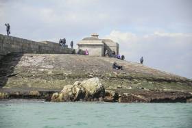 A large piece of stonework has been dislodged from the roundhead apron at Dun Laoghaire&#039;s West Pier