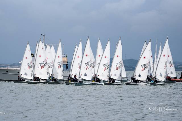 Tight start in the first race of the 28-boat Laser Radials at the Irish Sailing Youth Nationals in Cork Harbour today. Scroll down for photo gallery