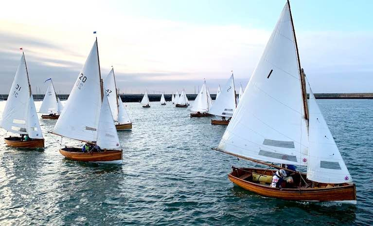 With all of Dun Laoghaire Harbour to play with, and an unusual evening onshore breeze, the Water Wag fleet takes all the tactical options on Wednesday evening. Polly (31, Roger Mossop &amp; Henry Rooke), Badger (20, John &amp; Anne Marie Cox) and Ethna (1, David Sommervillle &amp; Pauline McNamara) in foreground