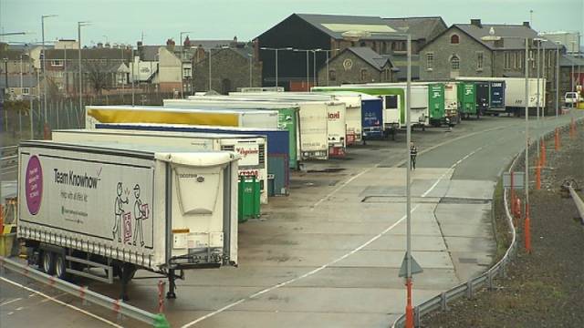 Hauliers have grave concerns over a hard Brexit, above truck trailers parked in Holyhead, north Wales.