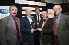 (L to R) Industrial Heritage Association of Ireland President Paul McMahon, Gary MacMahon of the Ilen Project, ESB Director Nicholas Tarrant, Father Anthony Keane (Ilen Project), and Michael English (IHAI Board Member) at the presentation of the IHAI’s Best Restoration of 2019 .