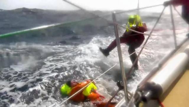 A shot from the dramatic rescue from the Pacific as caught on video from the deck of Derry~Londonderry~Doire