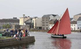 The restored 137 year-old Gleoiteog, the Lovely Anne, sails to Claddagh Quay during it&#039;s re-launch in Galway city. The boat, built in 1882, was restored as part of a community training project between Bádóirí an Cladaig and Galway Hooker 2020.