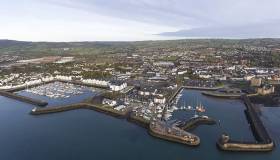 An aerial view of Carrickfergus marina (left) the sailing club (centre) and the town Harbour on the right in County Antrim