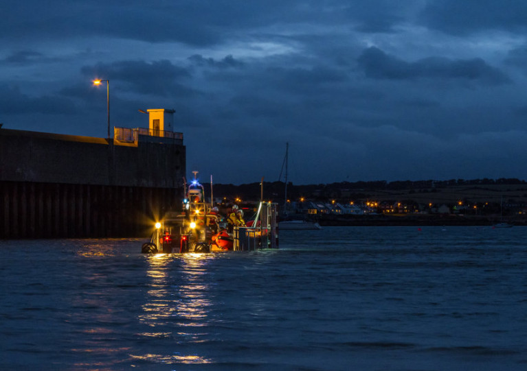 Skerries RNLI crew launch their inshore lifeboat in the rapidly fading light on Tuesday evening