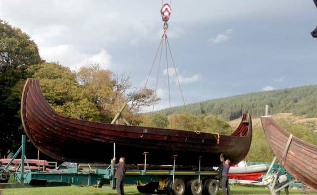 A 50–foot Viking longboat is lifted off a trailer in advance of filming on Lough Dann in County Wicklow for the Viking TV series. Plans are afoot to locate one of the Norse boats at Dun Laoghaire Harbour