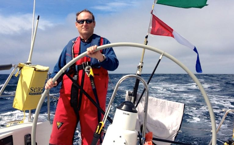 Peter Ryan at the helm of the J/109 Mojito in the 2013 Fastnet Race. An active offshore racer since the 1980s, he continues in the sport while making a significant contribution to its administration