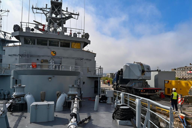 Naval Service Basin: Main arnament of the LE Eithne,  a Bofors 57mm Gun after receiving essential maintenance awaits on a truck-trailer before crane-mounted operation to reinstall on board at the fo&#039;c&#039;sle, i.e in front of the bridge overlooking the bow. 