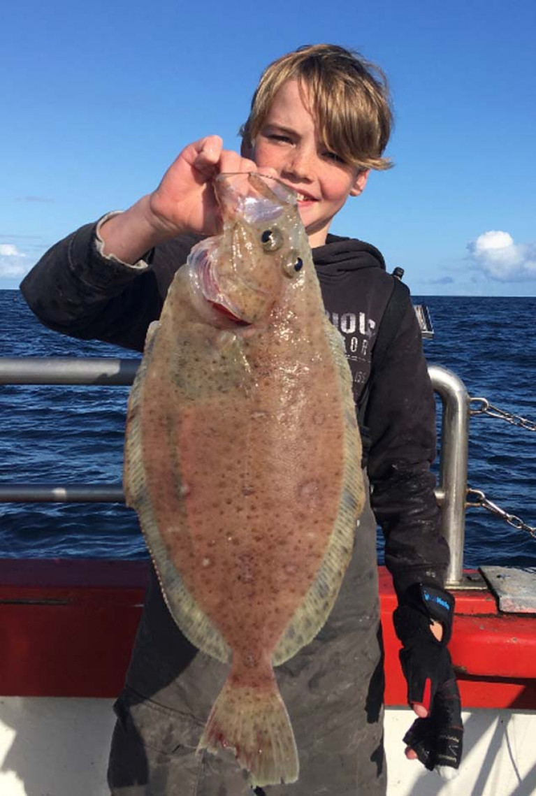 Evan Collins who won the Dr AEJ Went Award for "Young Specimen Angler of the Year"
