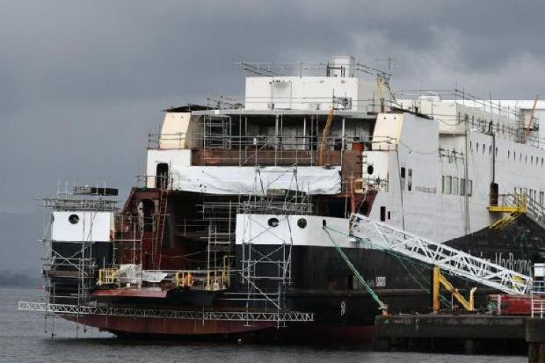 The Glen Sannox (Afloat adds seen at an earlier stage of the duel-fuel ferry's construction) at the Ferguson Marine shipyard located at Port Glasgow on the Clyde, Scotland