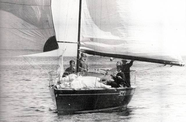 Blast from the past. It’s August 1980, and the magic Half Tonner Swuzzlebubble (Bruce Lyster, RStGYC) is trickling towards the finish of the ISORA Pwllheli-Howth race which she won overall to confirm her as ISORA Champion 1980. She also won ISORA Week 1980, and her class in Cowes Week 1980. Crew on board are (left to right) Bruce Lyster, Robert Dix on helm, Michael Rowan, Drewry Pearson (white hat), and Des Cummins