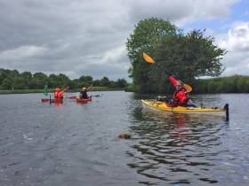 Ger Harrington, Peter Brewitt and James Lynch paddle on the Shannon
