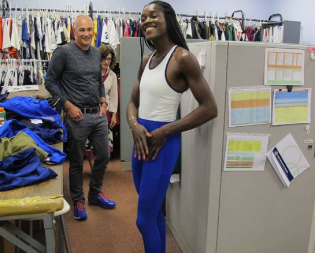Textile engineer Mark Sunderland with US Olympic rower Chierika Ukogu fitting for the new unisuit design