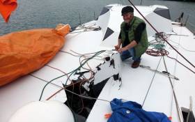 Yachtsman Enda O&#039;Coineen with the damage to his yacht, the Kilcullen Voyager