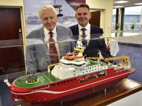 Sir David Attenborough and Cammel Laird CEO John Syvret with a model of the £150m polar research vessel. The famous naturalist and broadcaster attended a keel-laying ceremony of the Sir David Attenborough at a UK shipyard yesterday   