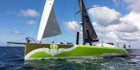 Enda O&#039;Coineen&#039;s IMOCA 60 arriving in Kinsale this past August fresh from its refit in France with new race livery