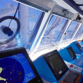 Guests of the high-end luxury operated Star Pride have an opportunity to visit the wheelhouse to examine navigation charts with the Captain, which is Windstar Cruises Open Bridge Policy. Afloat adds the above bridge is from either of the sail-assisted sisters, Wind Star and Wind Spirit.