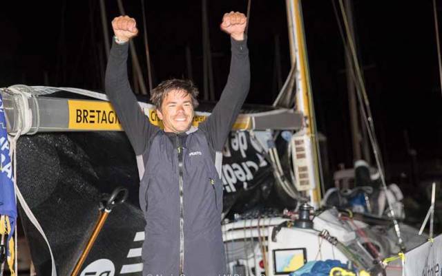  Sebastien Simon (Team Brittany Cmb) raises his arms in victory at the end of the second stage