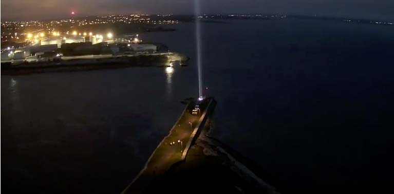 An aerial view of the beam, and of the illuminated port and city, was filmed by Electric Skyline (see vid below)