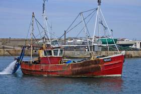 A fishing boat in Howth on the Irish Sea, where many Irish trawlers fish within British territory