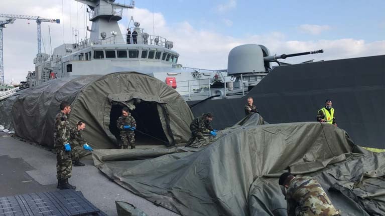 A tented field hospital beside the Naval patrol ship, LE William Butler Yeats in Galway Docks 