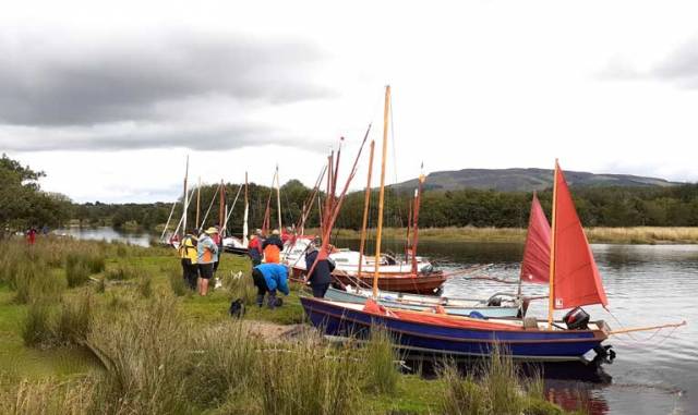 Lunch break with a difference – the exploring flotilla of Drascombes at a natural berthing spot in the hidden entrance to the “upper Upper Shannon” at the north end of Lough Allen. The rising ground in the background leads on to Cuilcagh, location of the river’s traditional source at the Shannon Pot