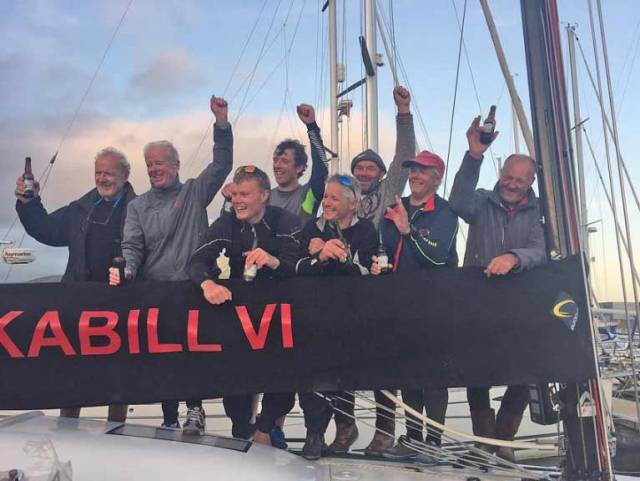 Paul O’Higgins (second left) with the crew of Rockabill VI in Dingle after winning the race from Dun Laoghaire